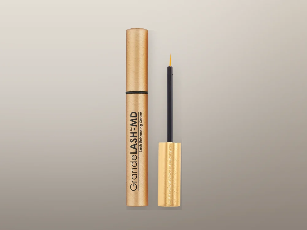 GrandeLASH-MD, a prostaglandin-analog lash serum, on a dark background